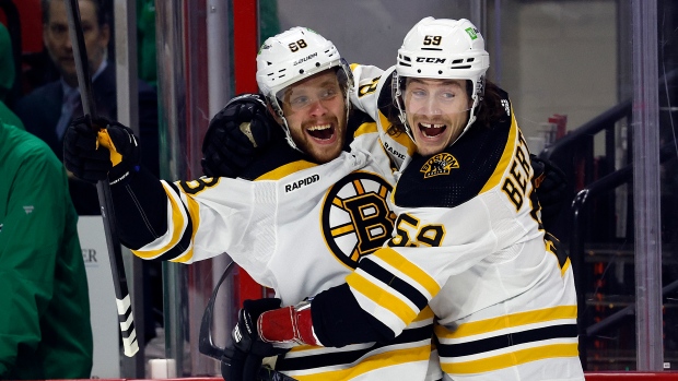 Pastrnak scores twice, Bruins top Hurricanes in shootout