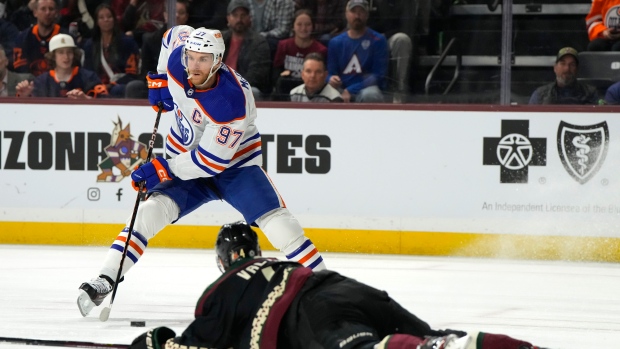 Oilers hold off Coyotes as McDavid reaches 140 points