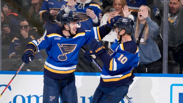 Vrana scores twice as Blues top Canucks in OT