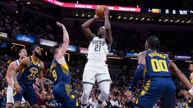 Holiday brings 'electricity' in first Celtics practice