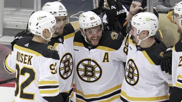 Pastrnak's 14th career hat trick lifts Bruins by Penguins,