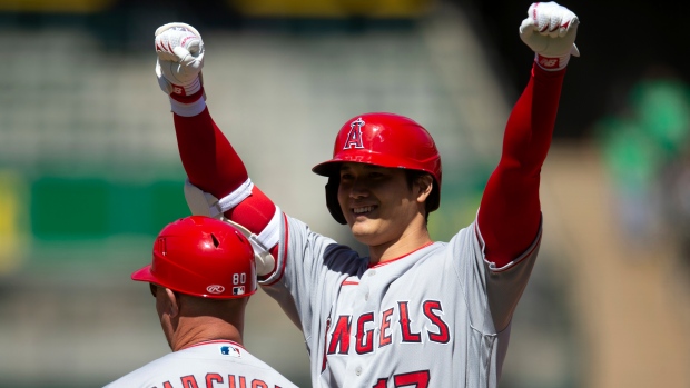 Angels score 11 in 3rd inning to thump A's