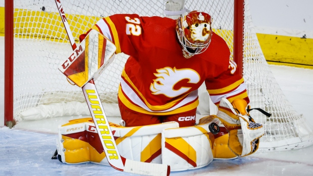Flames goalie prospect Wolf vows to be ready when his time comes