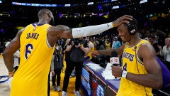 Los Angeles Lakers' LeBron James and Lonnie Walker IV