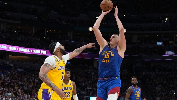 Nikola Jokic Anthony Davis , The Canadian Press Nikola Jokic Anthony Davis