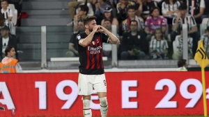 Milan beats Juventus to secure spot in Champions League