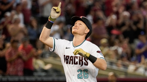 Smith hits three-run homer, D-backs rally to top Rockies