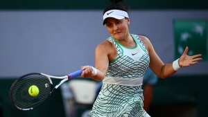 Andreescu beats Azarenka to advance to second round at Roland-Garros
