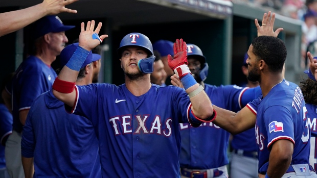 Jung homers, Heim drives in four to lift Rangers over Tigers
