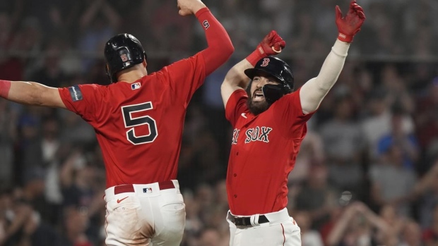 Devers breaks tie in six-run eighth as Red Sox beat Reds to avoid sweep