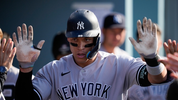 Judge homers, makes big catch in Yankees' win over Dodgers