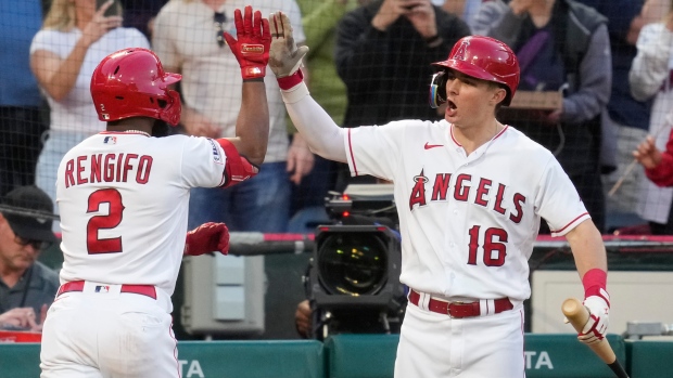 Trout, Moniak use bats and gloves to power Angels past Cubs