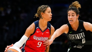 Cloud, Atkins help Mystics turn back late Storm rally on day Bird honored in Seattle