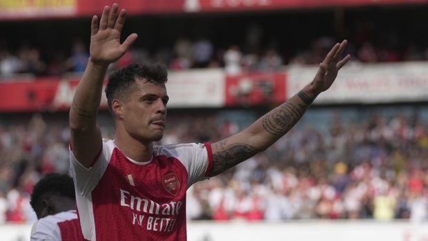 Bayer Leverkusen signs Switzerland midfielder Xhaka from Arsenal