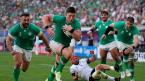 Sexton returns and leads a record-setting day for Ireland at Rugby World Cup