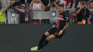 Leverkusen strikes late to hold Bayern in Munich to declare itself a Bundesliga title contender