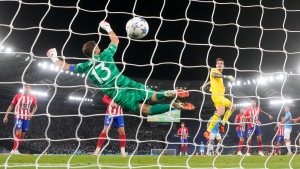 Lazio goalkeeper Provedel scores late equalizer in draw Champions League with Atletico Madrid
