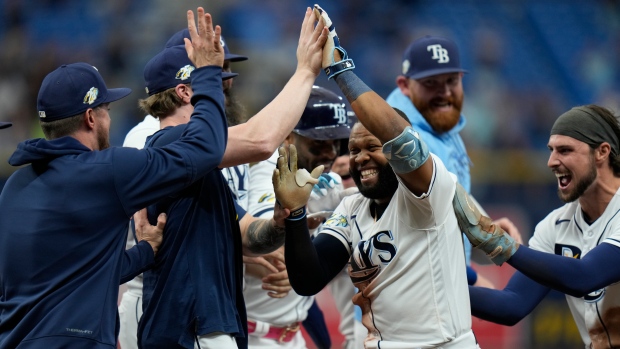 Playoff-bound Rays rally in ninth to beat Angels