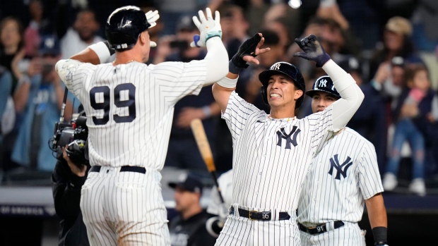 Judge hits three homers as Yankees slow down Diamondbacks
