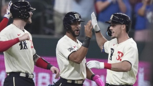 Rangers back on top of AL West after win in opener over Mariners