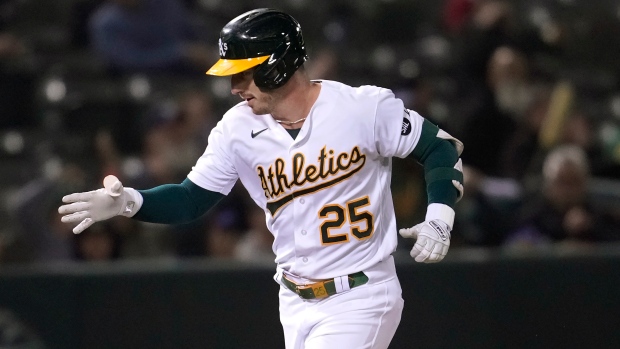 A's rally to beat Tigers, end eight-game losing streak