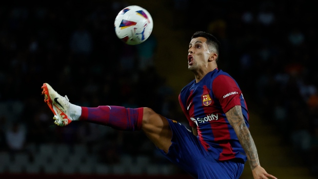 Lewandowski, Cancelo lead Barcelona to comeback win over Celta Vigo