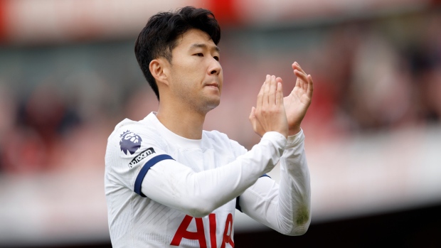 Son scores twice as Tottenham rallies to draw with Arsenal