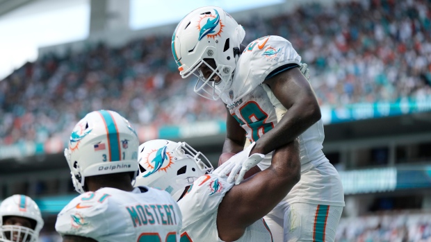 Dolphins rout Broncos, scoring most points by an NFL team in a game since 1966