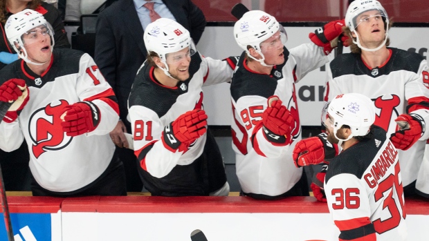 Hughes' three-point night leads Devils over Canadiens
