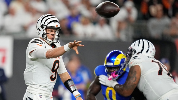 Burrow shakes off calf injury, throws for a season-high 259 yards as Bengals beat the Rams