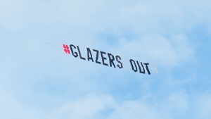 Man United fans fly 'Glazers Out' banner over Tampa NFL stadium