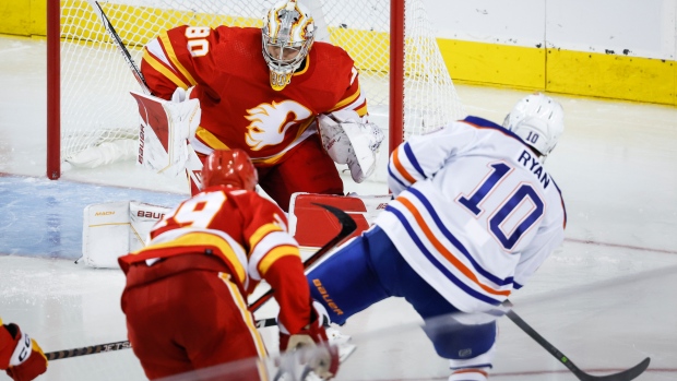 Malone scores in OT as Oilers rally to beat Flames