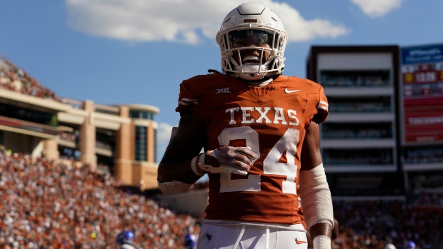 Brooks and No. 3 Texas beats No. 24 Kansas