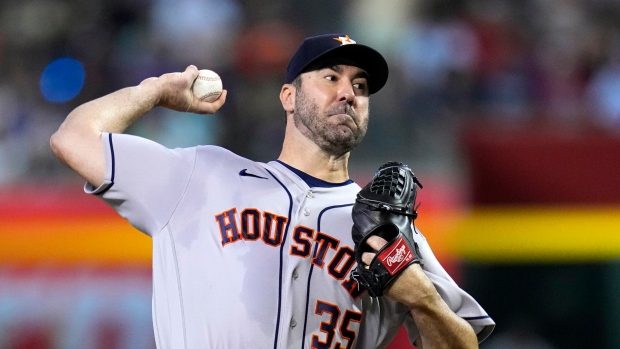 Verlander leads Astros over D-Backs as both teams clinch postseason spots