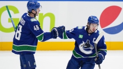 Quinn Hughes Cole McWard