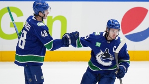 Hughes helps Canucks power past Oilers in pre-season aaction