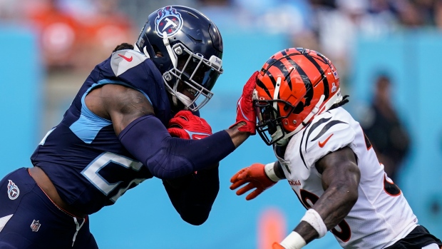 Henry runs for TD, throws for score as Titans rout Burrow, Bengals