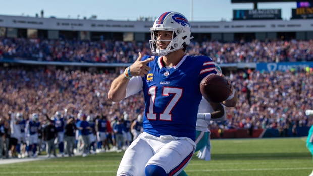 Allen throws four TD passes, runs for score, Bills rout division rival Dolphins