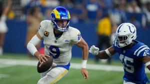 Stafford overcomes injury to lead Rams over Colts in OT