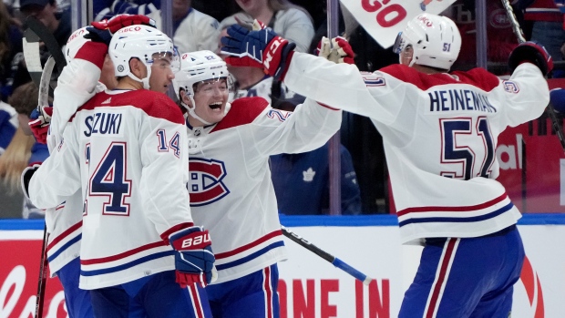 Suzuki scores in OT as Canadiens rally to edge Maple Leafs
