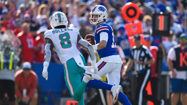 Jevon Holland and Josh Allen, The Canadian Press Jevon Holland and Josh Allen