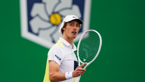 Tennis player apologizes for hitting a chair umpire with ball in Shanghai Masters qualifying