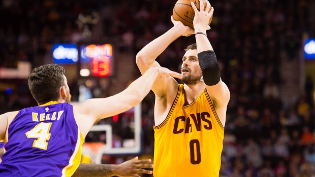 Kevin Love shoots over Ryan Kelly, Jason Miller/Getty Images Kevin Love shoots over Ryan Kelly