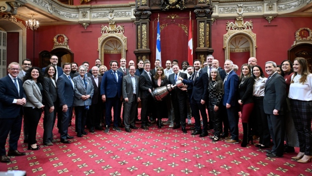 Members of Quebec's National Assembly and Montreal Alouettes players