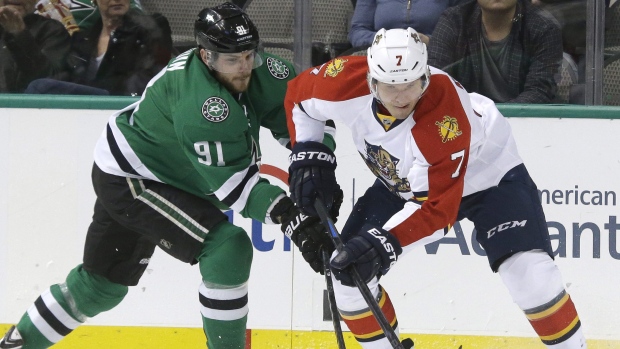 Seguin and Kulikov, The Canadian Press Seguin and Kulikov