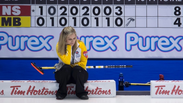 What is the asterisk on the scoreboard during the Brier?: Curling