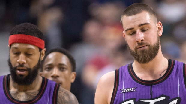 Jonas Valanciunas and James Johnson, The Canadian Press Jonas Valanciunas and James Johnson