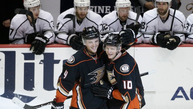 Corey Perry and Cam Fowler, The Canadian Press Corey Perry and Cam Fowler