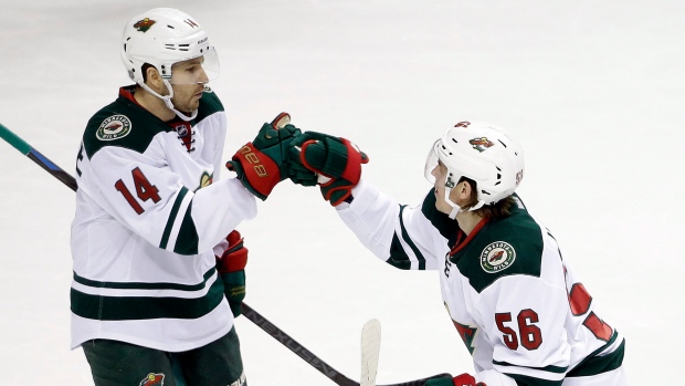 Erik Haula and Justin Fontaine , The Canadian Press Erik Haula and Justin Fontaine