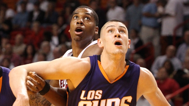 Hassan Whiteside and Alex Len, Miami Herald/Tribune News Service/Getty Images Hassan Whiteside and Alex Len